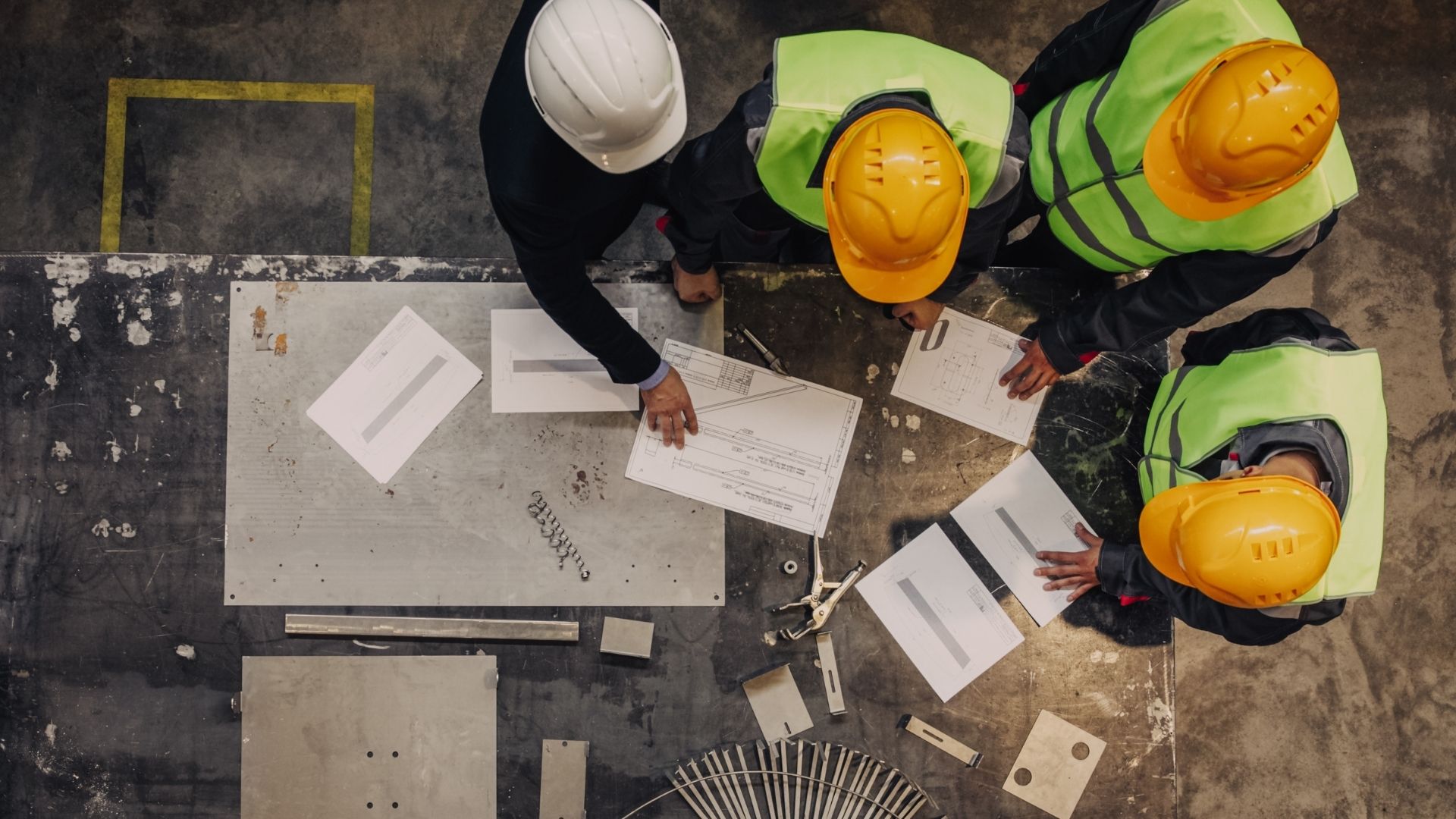 Photo of men in hard hats illustrating safety culture.