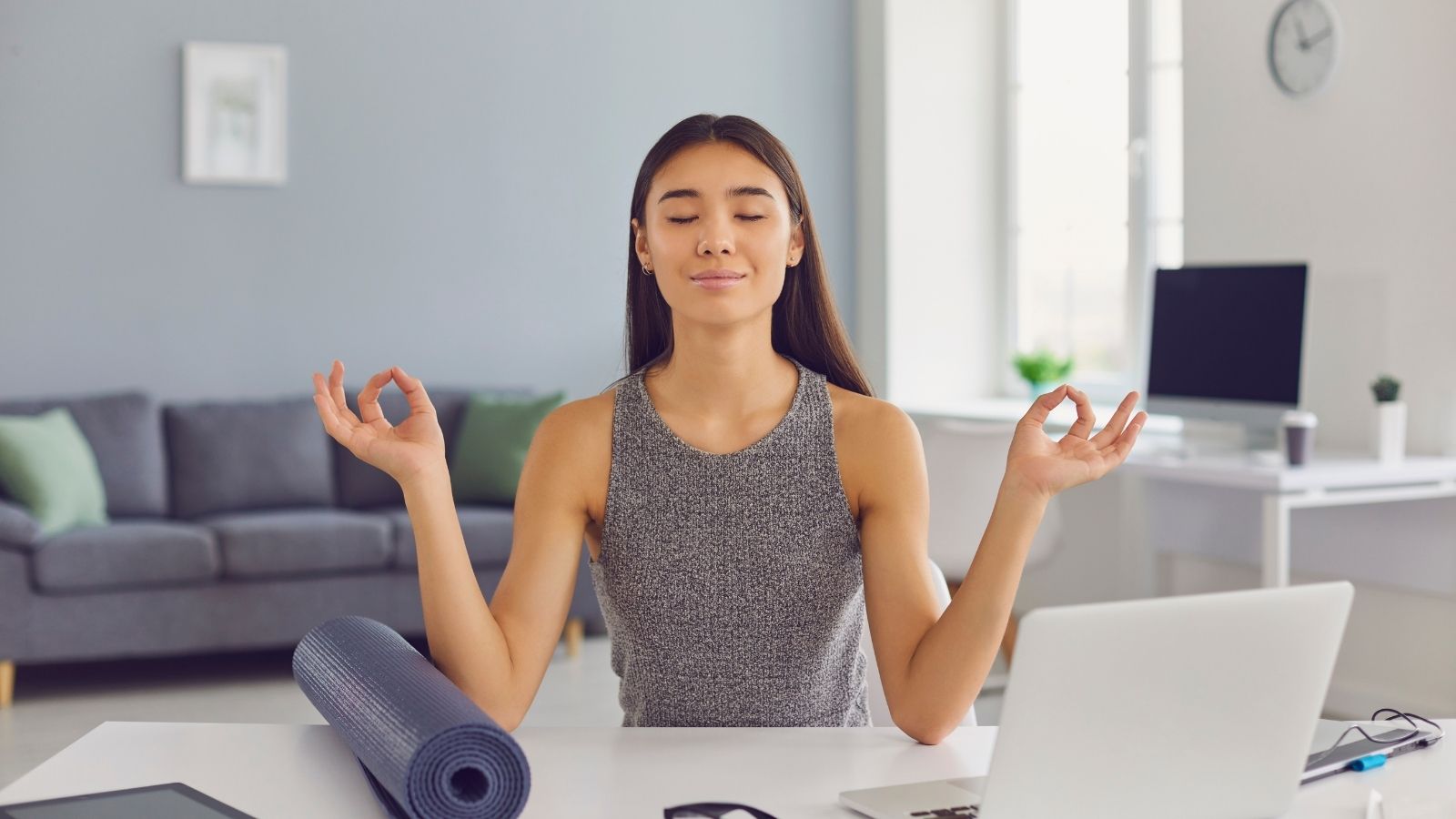 Photo of woman at computer illustrating Work Life Balance Tips