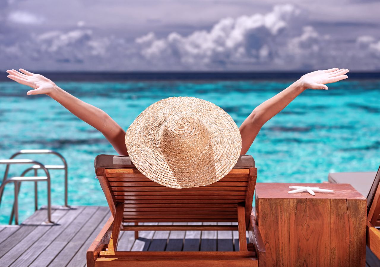 Can you negotiate vacation time Photo of woman on beach to illustrate "Can you negotiate vacation time?"