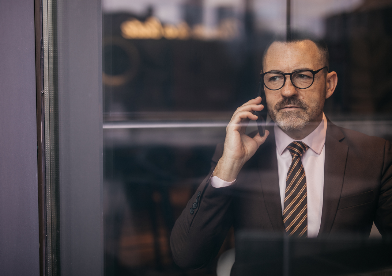 photo of man making phone call to illustrate candidate ghosting