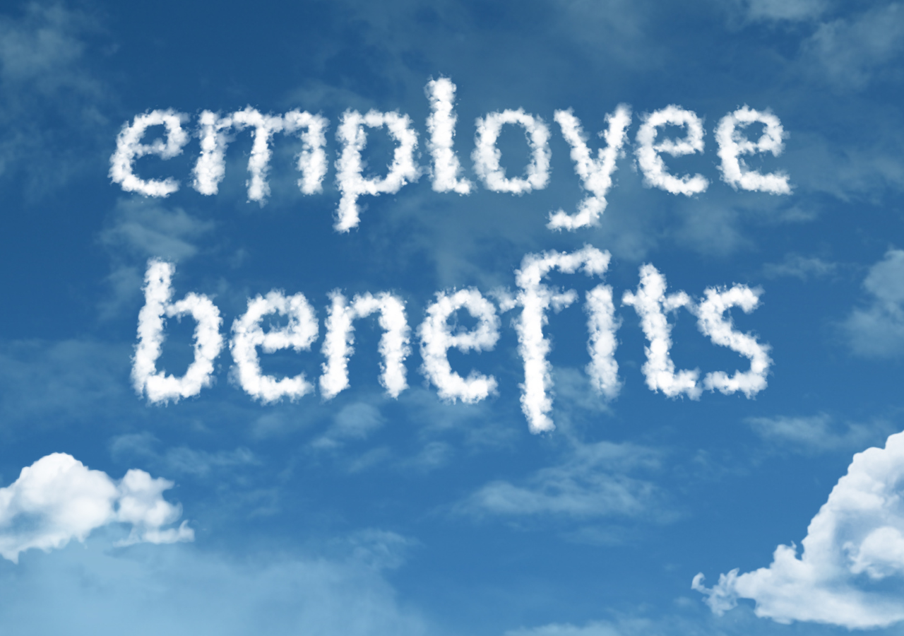 photo of a cloud that reads "employee benefits in 2022"