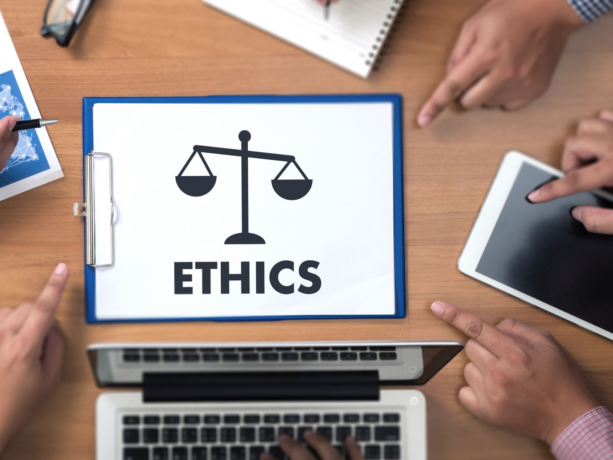 Photo of a computer screen that reads "ethics" to illustrate how to run an ethical workplace.